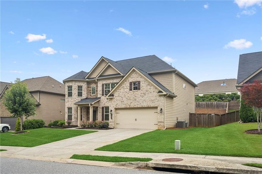 Move-in ready home in desirable North Forsyth! This beautiful 5-bedroom, 4-bath home offers an open-concept layout perfect for modern living. Built in 2017, it features a bright and spacious kitchen that flows seamlessly into the family room — ideal for entertaining. Fresh interior paint throughout makes it feel brand new! A convenient main-level bedroom and full bath are perfect for guests or a home office. Upstairs, you’ll find a large owner’s suite and generously sized secondary bedrooms, each with its own designated bathroom. Step outside to a great backyard — perfect for relaxing, playtime, or gatherings. Enjoy North Forsyth living with easy access to top-rated schools, parks, and shopping.