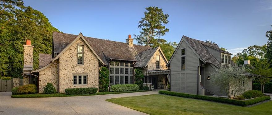 An English inspired masterpiece thoughtfully designed by architect Bobby McAlpine and Builder Shaba Derazi brings a feeling of historic charm to Buckhead. Truly no details have been left untouched in the oak floors, pecky cypress accents & limestone fireplaces. Light filled entrance foyer leads to breathtaking living room and dining room. Chef's kitchen that opens to the keeping room offers stunning wood details, oversized island and Wolf/Subzero appliances. Sought after primary suite on main hosts dual dressing areas and spa-like primary bath as well as adjoining study. The primary bath offers dual vanities, dual shower and dual water closets as well as heated floors. The manicured grounds are reminiscent of the English countryside with pool, level backyard and lush garden area on over an acre of land. The property also consists of a free standing cottage used as a pool house as well as a detached two car garage with finished space above as a guest suite. The property has geo-thermal heating and air systems and private well water serving the pool, irrigation system and home. Truly a special home on a coveted Buckhead street!