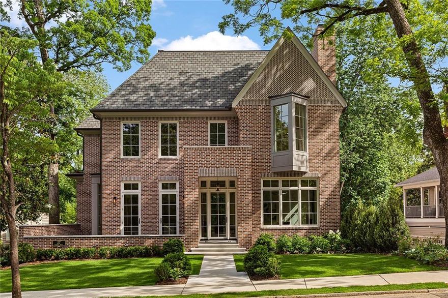 Introducing 27 Maddox Drive—a rare and exceptional new construction opportunity in the heart of Ansley Park. Designed and developed by the renowned Stainback Hess Studios, this 5-bedroom, 6.5-bath residence combines timeless architecture with elevated, high-end finishes and beautifully proportioned, light-filled spaces throughout. At the heart of the home, a stunning kitchen with custom cabinetry by Kingdom Works opens to a spacious, sun-drenched family room. A generous scullery and butler’s pantry enhance everyday living and entertaining with effortless function and style. Four fireplaces offer warmth and ambiance across the home’s thoughtfully designed living spaces: one in the formal living room, one in the family room, one on the covered rear loggia overlooking the pool, and one on the lower-level patio beside the pool—creating inviting moments indoors and out. Upstairs, four ensuite bedrooms include a spectacular primary suite with a spa-inspired bath. The terrace level features a fifth bedroom and bath, plus a full kitchen and bar in the expansive entertaining space with seamless access to the private backyard, pool, and limestone patio. Limestone patios grace both the front entry and rear outdoor living areas, enhancing the home’s elegant curb appeal and outdoor experience. This is a rare chance to own a newly built home in one of Atlanta’s most iconic neighborhoods—where classic design meets modern luxury.
