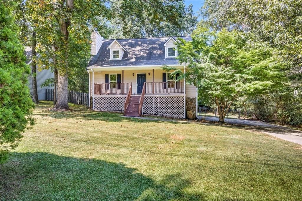 Charming Home in Sought-After Buford City Schools District Welcome to this beautifully updated home in a desirable Buford neighborhood, offering both character and modern comfort. Enjoy relaxing on the spacious rocking-chair front porch before stepping inside to a freshly painted interior with all-new flooring throughout. The main level features a primary suite, cozy living room with fireplace, kitchen, dining area, and a convenient half bath. Upstairs, you'll find two oversized bedrooms and a full bathroom, providing plenty of space for family or guests. The finished basement offers even more living flexibility with a bedroom, half bath, laundry room, additional living area, and a one-car garage. Outside, the large flat yard is perfect for pets, play, or entertaining. And within the next 30 days, a brand-new deck will be installed, adding the perfect spot for outdoor gatherings. With its updates, charm, and location in the award-winning Buford City Schools district, this home is a rare find!