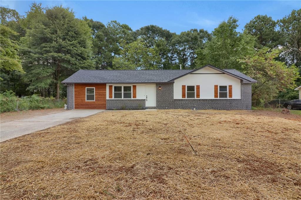 Welcome to this beautifully remodeled ranch-style home, perfectly blending modern updates with timeless charm. Featuring 4 spacious bedrooms and 2 full bathrooms, this home offers an open-concept layout ideal for both everyday living and entertaining. The fully renovated kitchen boasts brand-new cabinets, quartz countertops, stainless steel appliances. Fresh flooring, updated lighting, and neutral paint run throughout, complemented by new windows that flood the space with natural light. Both bathrooms have been completely updated with designer tile, new vanities, and fixtures. Enjoy the expansive backyard perfect for relaxing or hosting guests. Conveniently located in a quiet, established neighborhood near parks, shopping, and schools, this move-in-ready home is a rare find!