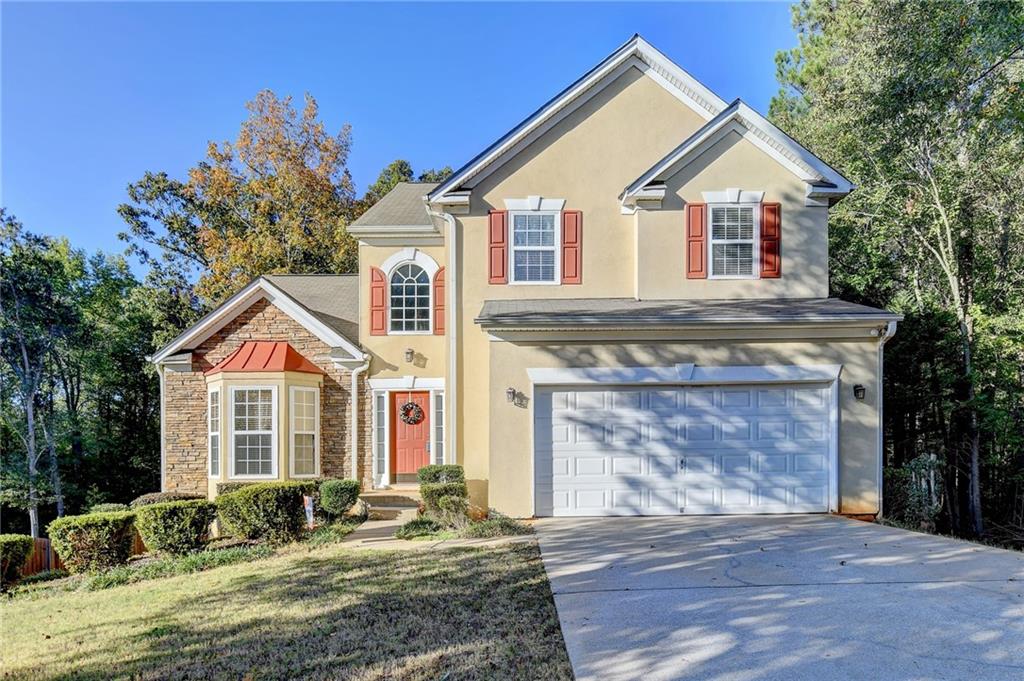 Welcome to this beautiful 4 bedroom, 2.5 bathrooms home. This home is move-in ready and features an open floor plan with Master suite is on main level. The master suite includes a separate garden tub and shower, as well as a walk-in closet. Enjoy Spacious 2 story foyer and family room with a view to the kitchen. The kitchen boasts white appliances and plenty of cabinet space. The oversized 3 bedrooms upstairs provide ample space for everyone with a double vanity. Partially finished basement. Outside, you'll find a level driveway and private huge fenced backyard with double deck. Residents of this community have access to swim. Don't miss out on this fantastic opportunity to live in a great neighborhood