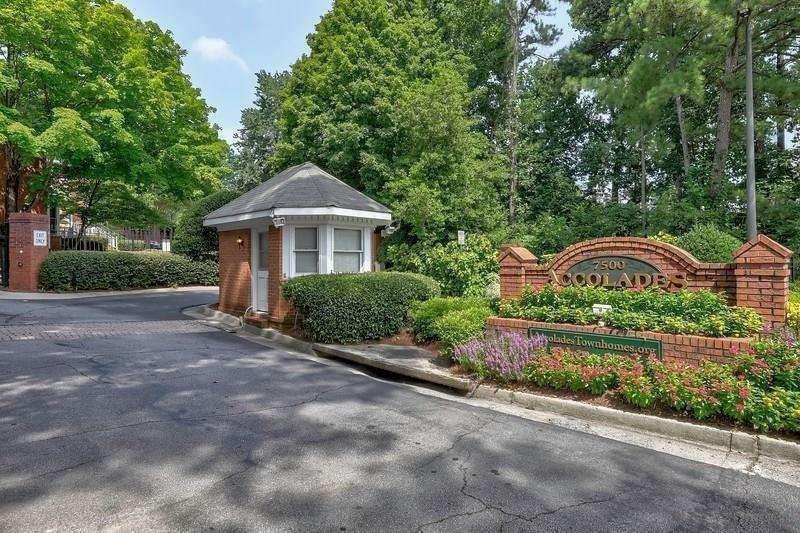Gorgeous Unit in a Gated Swim and Tennis Community in heart of SANDY SPRINGS. Hardwood floors on main living area. Sunroom with tile floor. Newer kitchen with granite counter tops and stainless steel appliances . Two bedrooms and two baths on second floor( Recently renovated bathrooms) and half bath on main level with great views from kitchen and sunroom. Rent includes water,trash and sewer. Very clean and ready to move in. Walk to shopping, restaurants and public transportation.