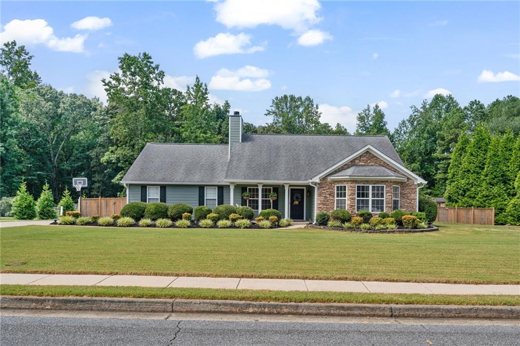 Welcome to your dream home in Buford, GA! Situated on a spacious and private lot, this beautifully updated 3 bed / 2 bath ranch offers the perfect blend of modern convenience and homie charm inside and out.
Step inside to an open-concept layout that flows effortlessly from the living area into a fully upgraded kitchen featuring all-new Whirlpool appliances, including a double oven with electric cooktop, refrigerator, and dishwasher. Smart blackout shades (voice-controlled with Alexa) let you instantly set the mood, while upgraded lighting and finishes create an inviting, warm ambiance throughout.
The primary suite is pre-wired for your wall-mounted TV, and even the laundry room is thoughtfully equipped with desk space, ideal for remote work or daily organization.
Step outside and enjoy your very own private retreat. The freshly painted exterior, new front door, and modern, matching exterior lights set the tone from the curb. Out back, you'll love the 6ft wood privacy fence enclosing a peaceful, oversized yard complete with a composite wood deck that's perfect for entertaining and a greenhouse ready for your green thumb or year-round hobbies. Whether you're relaxing, planting, or hosting friends this backyard was made for it all.
Additional upgrades include a Nest doorbell camera, ATD alarm system, and dedicated TV wiring in the back patio, primary suite, and guest bedrooms.
This home is more than a place to live, it's where memories are made. Located just minutes from shopping, dining, top-rated schools, and all the charm Buford has to offer, this gem won't last long!