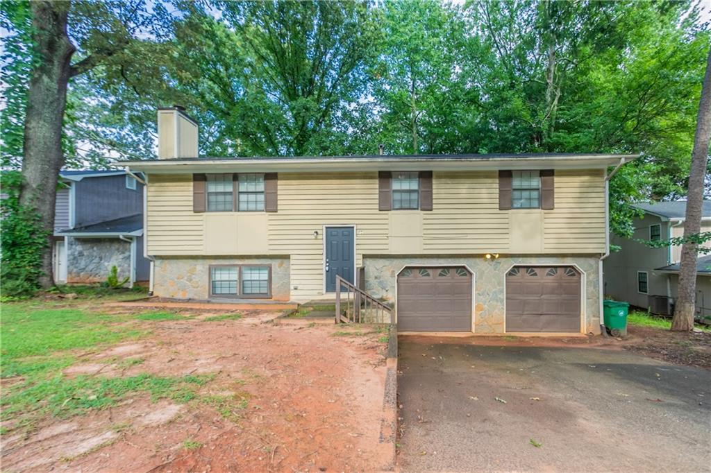 This spacious 5-bedroom, 3-bath split-level home offers flexible living across multiple levels — perfect for multigenerational families or those seeking room to grow. The open foyer leads to a large great room and family room, with a central fireplace adding warmth and charm. Tucked away on a private lot in the Crystal Lake community, you’ll enjoy a quiet setting just minutes from major roads, public transportation, and shopping. With a built-in two-car garage, fenced yard, and back deck, this home delivers both function and comfort in a well-connected location.
