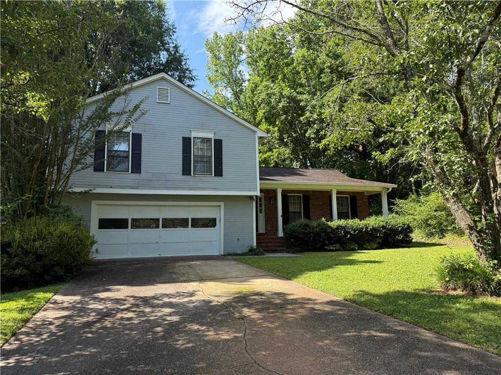This beautifully maintained home at 1253 Tinderbox Lane offers 4 spacious bedrooms and 3.5 bathrooms, including two primary suites—one conveniently located on the main floor and a second upstairs. The home features an inviting covered front porch and an expansive back deck overlooking a fully fenced backyard, ideal for entertaining or relaxing in privacy. The interior includes bright and open living spaces with ample natural light, a well-appointed kitchen, and generous storage throughout.
Located just minutes from I-75 and Kennesaw State University, this property offers quick access to shopping, dining, parks, and top-rated schools. Minimum credit score 650 and income must be 3x monthly rental amount.