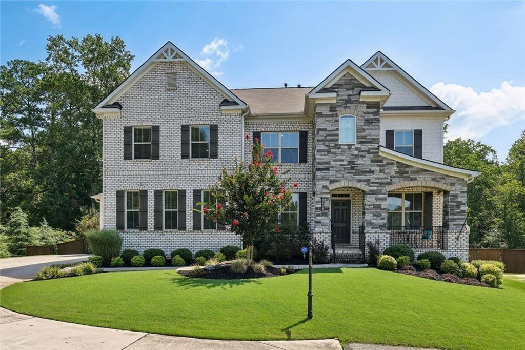 This beautifully maintained home offers the perfect balance of style, function, and flexibility. From its inviting curb appeal—framed by professional landscaping and a charming front entrance—to its thoughtfully designed interior, this property is ready to impress.
Step into a bright, spacious foyer that leads to open concept living areas flooded with natural light from large windows. The main level features a versatile office or guest bedroom, a formal dining room for entertainment, and an updated kitchen with modern appliances, a generous center island, and a butler’s pantry for extra prep and storage space. The adjacent sunroom offers panoramic views of the backyard, creating a perfect space to relax and unwind.
The bedroom level includes generously sized rooms with great closet space and updated bathrooms with modern finishes. Oversized laundry room with walk in feature to the owner’s closet. What a dream!
Downstairs, the terrace level adds incredible value and flexibility. It includes a bedroom or additional office space, a gym or workout area, ample storage, and a separate kitchen—ideal for hosting guests, in-laws, or creating a private retreat. Walk right out to the pool deck and enjoy your own backyard paradise, complete with a sparkling pool, lush landscaping, and multiple areas for dining, entertaining, or simply soaking up the sun.
This home offers an abundance of well-designed space, both inside and out, with endless potential for personalization. Located in a desirable, convenient neighborhood, it’s a true retreat that combines everyday comfort with resort-style living.