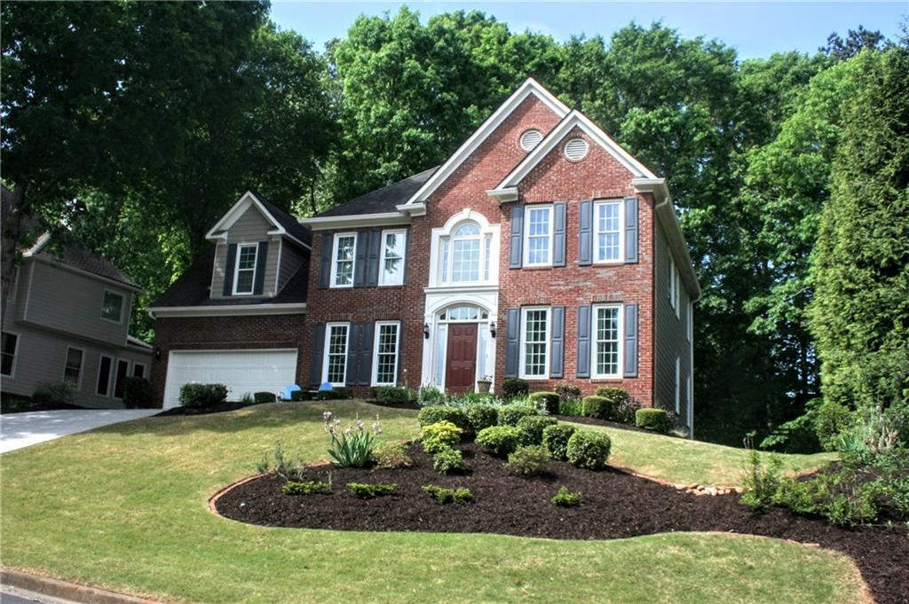Lovely 4 BR 2.5 BA on partially finished basement home in beautiful River Plantation. This natural light filled home has all hardwood floors on the main level with a beautiful 2 story entry foyer, a formal sitting area or office, separate dining room, large great room with wall of windows, breakfast area, huge laundry room with tons of storage and newly renovated kitchen. Upstairs features all bedrooms including large primary suite with huge walk in shower, jetted tub, quartz countertops and walk in closet. Jack and Jill second full bath has two separate vanity areas and shared shower area easily servicing the remaining 3 bedrooms. The daylight basement is partially finished with a large playroom(sq ft not included in tax records) and large unfinished space stubbed for bath. The low maintenance backyard is a wooded paradise with tons of perennials and plenty of room to play, cook out or just enjoy the birds. All newer windows, doors, gutters, and 2 year old deck River Plantation is situated along Suwanee Creek and the Chattahoochee River. With neighborhood access to a stroll along the river, wonderful swim/tennis and clubhouse facilities, a pavillion for gatherings/parties/meetings and fantastic playground on Suwanee Creek, it is a wonderful community in which to live, socialize and call home. It's just 5 minutes to 24-acre Rogers Bridge Park, Chattahoochee Dog Park & Sugarloaf Marketplace. Both downtown Duluth and Suwanee with great restaurants, breweries and entertainment are only minutes away. With top tier Peachtree Ridge High School District, and new Greenway Trail connector currently under construction at the front of the neighborhood this is truly a sought after community.