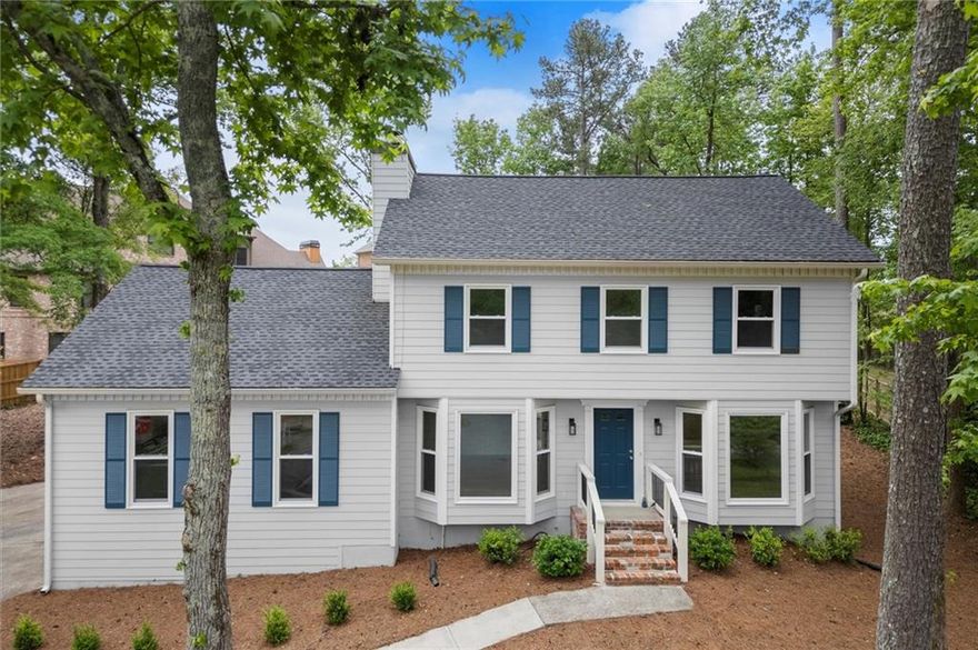 Create lasting memories in this renovated gem nestled in a cul-de- sac in East Cobb. Welcome home to this beautifully renovated home with fresh interior and exterior paint, new designer lighting, new white oak hardwoods, new plush carpet, and updated kitchen and bathrooms. Gather in the heart of the home in the family room and relax fireside by the fireplace with gas logs. Covet time alone or entertain guests on the newly built open-air deck, perfect for grilling and entertaining. Enjoy cooking your favorite meals in the updated kitchen featuring new shaker cabinetry with quartz countertops, tile backsplash, new stainless appliances including dishwasher, electric oven range, and built-in microwave. Getaway to the primary bedroom with new light/ceiling fan combo, new carpet, and large walk-in closet. Reset after a long day in the ensuite primary bathroom’s large, marble shower with glass enclosure, designer tile flooring, quartz countertop vanity, and new on-trend lighting and custom trimmed mirror. The secondary bedrooms including a newly finished room above the garage share a renovated bathroom with new quartz countertop vanity with soft close cabinetry, new tile flooring, and subway tiled tub/shower combo. Award-winning schools and close proximity to shopping, parks and dining complete the attributes that make this a must have home. Don’t miss this opportunity to own this beautifully updated home in a top school district.