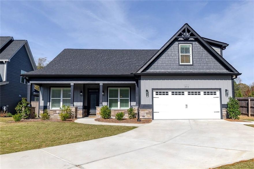 Welcome Home!    This designer Showplace Model Home is Meticulous and ready for immediate Move in! Location - Location and BETTER THAN NEW (2023) -this vibrant 55+ adult community (Buyers under 55 yrs of age may still qualify) is nestled in the heart of Marietta, only minutes to the Square/Kennesaw Mountain Park & trails. This captivating RANCH home (The Hampton floorplan) is located on the PRIME LOT in this 25-home community offering the BEST privacy with ample guest parking too. What an entertainer's dream home with Soaring ceilings, beamed ceiling in the family room, an inviting open floorplan, delightful SUNROOM with a custom Marble floor, and expansive newly added patio creating a private setting to entertain your guests. Three bedrooms on the main level (incl. the primary suite), plus a 4th bedroom, Bath, and an unbelievably spacious LOFT/FLEX SPACE UPSTAIRS (perfect future theatre/media room).    So Many upgrades - WOW.   Plantation Shutters throughout, barn door access to Laundry/mud/pantry room, formal dining with coffered ceiling, SPLIT BEDROOM PLAN, the list keeps going! Lawn maintenance & trash included in the HOA.    Sadly for Sale but MOTIVATED Seller says bring all offers & Can Move quickly!   This home offers the luxury, comfort, and convenience you desire.  ***Up to $30,500 in Down Payment assistance available to qualified buyers thru Preferred Lender. ****Come see and Fall in Love today!