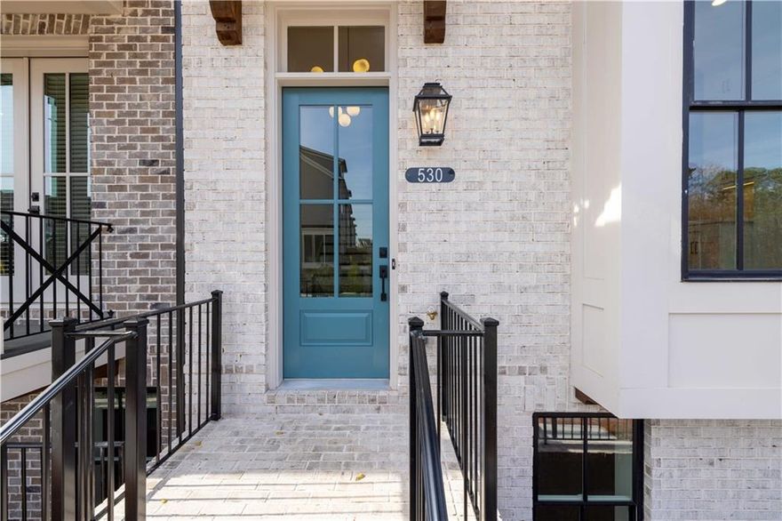 Summer of Savings at Towns on Thompson in Alpharetta, featuring our FINAL OPPORTUNITIES for The Chamberlain Plan selling now with $35k ANYWAY ON CONTRACTS WRITTEN IN JUNE. Step into a residence where thoughtful design meets timeless sophistication. This exquisite townhome floor plan features 10 foot ceilings on main level, 9 ft on the terrace and top levell. Hardwoods flooring on all 3 levels- no carpet! This home offers a modern luxury feel, with plenty of upgraded finishes and architectural details  This is a MUST SEE HOME!! The stunning and bright kitchen showcases GE Café appliances, industrial slide-in gas range with stainless steel vent hood.  Bright White Kitchen stacked cabinets and an beautiful accent oversized kitchen island with a Midnight finish color with Calacatta Miraggio Gold quartz that is also displayed on beverage center in dining area. Glossy white tile backplash vertically laid to ceiling. The oversized kitchen island features a waterfall detail with extra storage in a stunning Midnight color that ties in with the black and gold lighting. The kitchen space is illuminated nicely with natural light and from the beautiful black and gold statement pendants.  The living room/ dining room space includes a beverage center with matching Midnight cabinets to the island: Calacatta Miraggio Gold quartz, and floating midnight stained shelves- perfect for entertaining friends and family. The family room features a sleek fireplace with shelving and stacked quartzite to the ceiling, creating an inviting centerpiece. Walk down to the terrace-level suite offering a serene suite bedroom retreat with full bathroom with an elegantly upgraded walk-in shower, perfect for guests or multi-generational living. The upper-level owner's suite exudes luxury, with an expansive sitting area, customer-designed closets, and a spa-inspired bath featuring a freestanding soaking tub and walk-in shower with coordinating midnight cabinets, quartz countertops and black framed mirrors and hardware. Additional highlights include a sitting room with direct access to open deck! The secondary ensuite bathrooms in Bed 2 and 3 also coordinate with the black cabinets, framed mirrors and quartz countertops. Towns on Thompson- a boutique community of 48 townhomes combining luxury living with an exclusive feel. Ideally situated on Thompson Street separating Downtown Alpharetta from Avalon, the possibilities are endless in the heart of vibrant Alpharetta! ~ HOA: Dues include Professional Community Management. Landscaping. Comprehensive Building & Structural Insurance. Say Goodbye to roof maintenance, gutter cleaning, painting/staining, & landscaping! Let HOA cover repair & retreat of termite bond, weekly trash & recycling and so much more! *Homeowners have the optional right to join swim amenities at the Foundry*  Come find your next best place to live in Towns on Thompson.  [The Chamberlain]