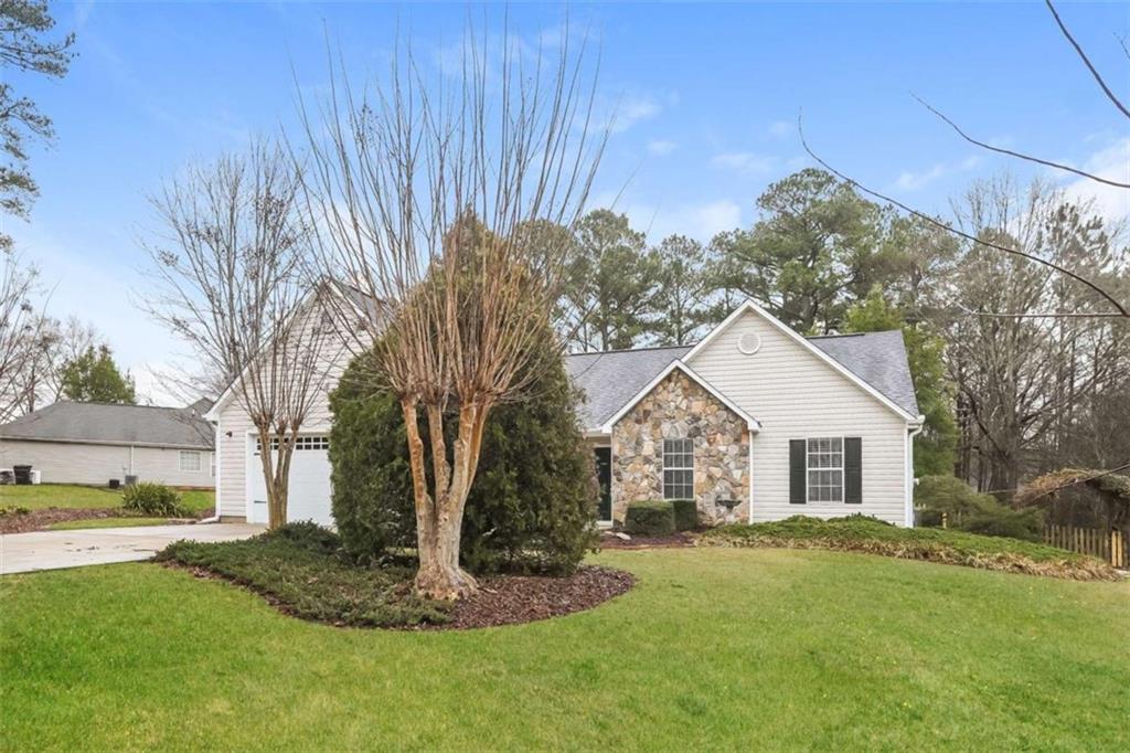 Lovely 3 bedroom, 2 bath home in scenic Loganville. This meticulously kept ranch-style home features high ceilings, granite countertops, and stainless steel appliances. Clean and move-in ready, the home offers an open and functional layout perfect for everyday living. Situated on a level lot with a manicured yard, it provides excellent curb appeal and outdoor space. Conveniently located just minutes from local shops, restaurants, and everyday amenities. A great opportunity for buyers seeking comfort, convenience, and charm in an established neighborhood.