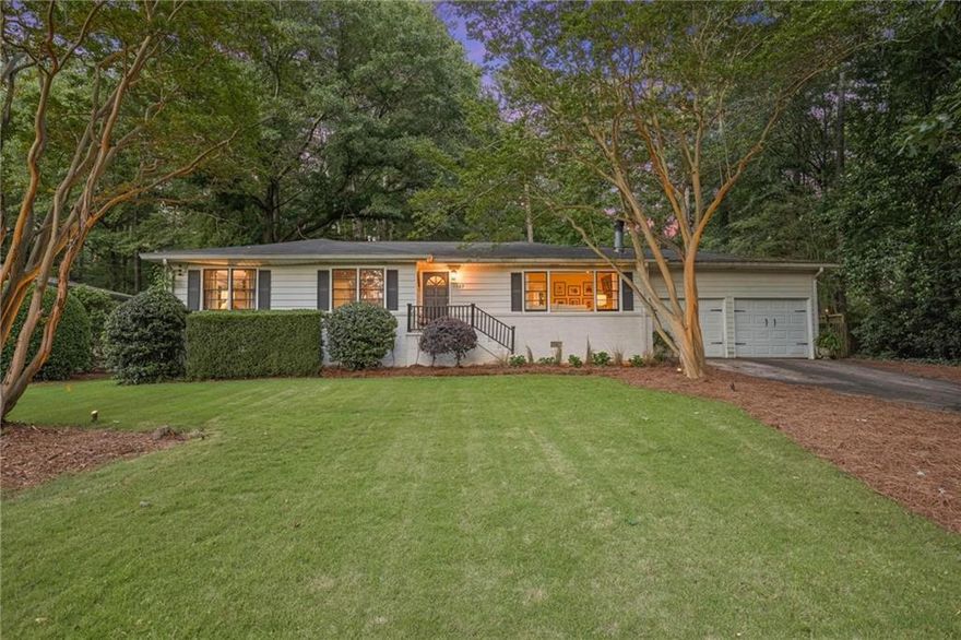 Tucked away in the quiet neighborhood of Forest Hills between Vinings and Smyrna this charming 3/2 is
special and a very smart buy! Updated and on an amazing 1/2 acre lot with firepit, large utility workroom and
large deck and garden!
Fireplace, 2 car garage and surrounded by more expensive homes! Close to Truist Park and Atkins Park too!