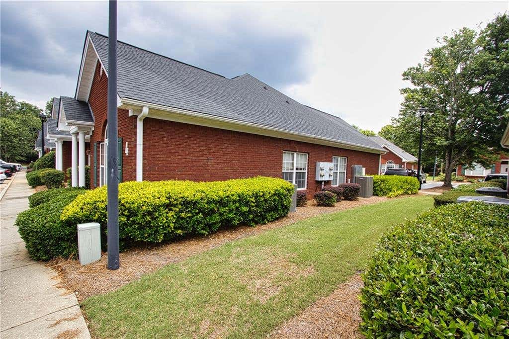 Photo of 7750 Hampton Place #7750A, Loganville, GA 30052 (MLS # 7786111)