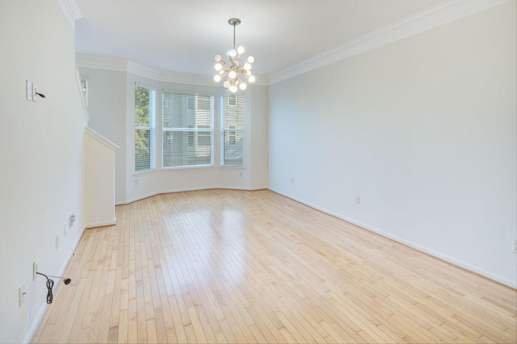 BEST PRICE IN THE COMMUNITY PLUS 5,000 TOWARDS CLOSING COSTS - PRIME LOCATION! 951 Glenwood Ave, Unit 1708 is a FRESHLY PAINTED 3 level gated townhome that is located on the almost completed BELTLINE. INCREDIBLE WALKABILITY, TOP NOTCH AMENITIES, AND A LIFESTYLE THAT DRAWS YOU INTO THE CITY AND ALL IT HAS TO OFFER. Spanning 1,792 square feet,
this spacious home offers an ideal layout for both relaxation, business, and entertainment. The property features three bedrooms and two and a
half bathrooms, providing ample space for comfort and privacy.
Located on the first floor is STEPLESS ENTRY into the home with the unit's garage, laundry room, and 3rd bedroom/office which opens up to the private fenced courtyard. On the main level is the large
main living area with expansive bay window that lets in an abundance of light and overlooks the soon to be completed Belt line and the community raised
garden beds. The kitchen is a perfect blend of a chef's kitchen with stainless steel appliances, plenty of cabinets, walk-in pantry, and counter space for the most avid chef and being open to the living and dining areas making it
perfect for entertainers! Dining area is large enough to accommodate not only a dining table but also additional serving pieces/shelving selections and has access to the deck that overlooks the private courtyard with a wooded view. On the top floor, the primary suite and secondary
ensuite bedroom are located to give each room ultimate privacy. The updated primary bath has double vanities with separate tub and large frameless shower. Primary suite is large
with tray ceiling, walk-in closet and bay window.
This townhome is located in a well established gated community that is lush with mature trees and landscaping - Unit 1708 is located at the back
of the neighborhood providing maximum privacy and yet just a short walk to wonderful neighborhood restaurants, retail, and parks. The pool,
clubhouse, dog park, fitness center, and community garden will give you many opportunities to connect with your neighbors. This is an amazing
opportunity to experience city living and be the recipient of rising home values being located on the beltline!
