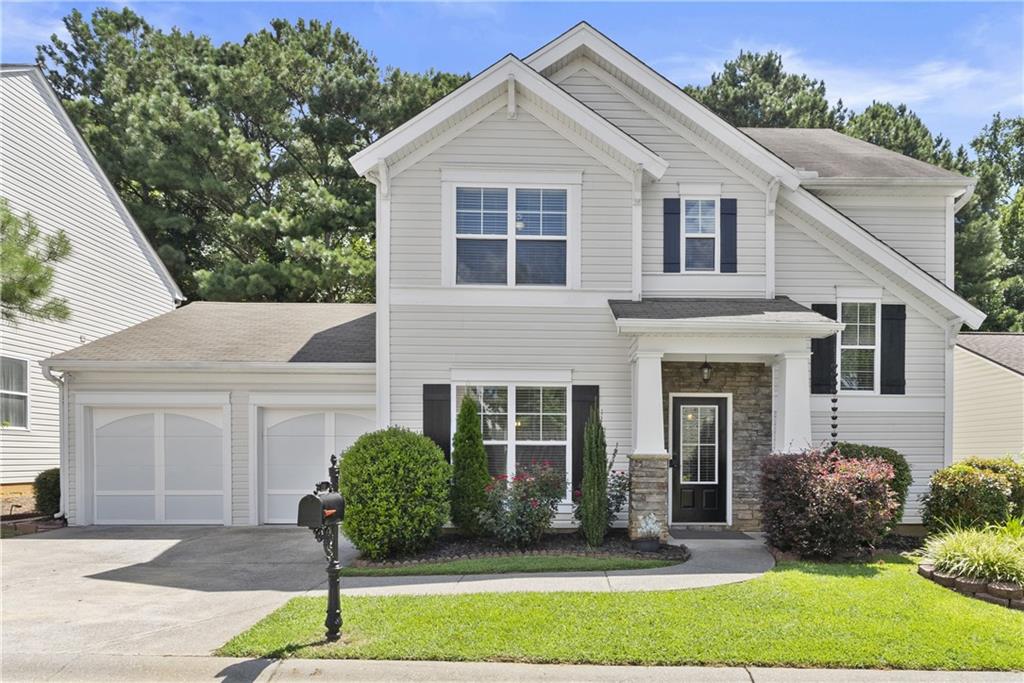 Fall in Love with this immaculate move-in ready home in Prominence Court!
Welcome to one of the largest backyards in the highly sought-after Prominence Court community! This beautifully maintained home features an expansive outdoor space, perfect for entertaining or relaxing. Enjoy a covered porch with a built-in bar and wall-mounted TV, an extended concrete patio with a stunning 10x10 metal gazebo, a fire pit, a storage shed, and mature landscaping that completes this inviting outdoor oasis.
Inside, the home is filled with thoughtful upgrades and stylish touches, including elegant light fixtures, wood plank accent walls, tasteful wallpaper, and fresh interior paint throughout. The spacious kitchen offers both electric and gas connections for the range, ample room for a breakfast table, and a separate formal dining room for special gatherings.
The family room is warm and inviting, centered around a floor-to-ceiling shiplap-framed fireplace, with a generous layout and views of the backyard. The main level also includes a convenient laundry room and a half bath.
Upstairs, you'll find three bedrooms, two full bathrooms, and a cozy sitting area—ideal for reading or relaxing. The luxurious owner’s suite is a true retreat, featuring a spa-like ensuite bathroom with a separate garden tub, and a walk-in shower.
Perfectly located just minutes from shopping, top-rated schools, I-575, and only 5 miles from vibrant Downtown Woodstock. This is a home you don't want to miss!