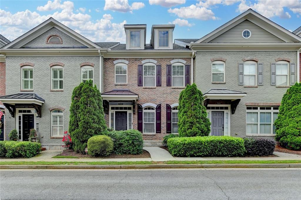 Welcome home to this immaculate, well maintained, 3 Bedroom, 2.5 bath townhome in the highly sought after Jamestown neighborhood, located in South Forsyth county minutes from GA-400. Jamestown is one of the most desirable gated communities in the area known for classic architecture and close proximity to Halcyon, Avalon, Downtown Alpharetta, Windward Corridor, and Johns Creek with an Alpharetta address and Forsyth County taxes. Exercise enthusiasts will enjoy the convenience of the Fulton Co and Forsyth Co Greenway trails, both within walking distance from this lovely townhome. There are gorgeous hardwood floors on both levels with an open main living floorplan. The large functional kitchen features a spacious island, granite countertops, stylish sleek white hardwood cabinets with gorgeous hardware and lighting. Enjoy the cozy three sided fireplace from the kitchen, dining and living areas. Just off the kitchen is a lovely courtyard patio perfect for fresh air entertaining. Upstairs laundry is convenient to the three bedrooms and two full baths. The primary suite offers a peaceful escape, complete with custom walk-in closet, an ensuite bathroom with large soaking tub, separate shower, dual vanities, and a water closet with added storage. The two car garage has added overhead space maker steel storage racks, and most convenient is a guest parking lot located directly behind the garage, with enough green space for a quick dog walk. This lovely community features a resort style pool, clubhouse, lighted tennis/pickleball courts, sidewalks and seasonal landscaping. Don’t miss this opportunity in Jamestown where the living is nice and easy in every way. Originally developed by the award winning Providence group.