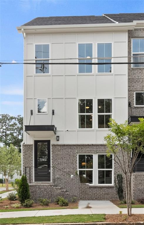 Welcome to 1871 Hollywood, a modern 4-story end-unit townhome by Pulte Homes in Atlanta’s vibrant Upper Westside. This 3 bed, 3 full bath + 2 half bath home includes a rooftop loft oasis, perfect for entertaining or relaxing. Enjoy a bedroom with full en-suite on the terrace level, and a gourmet kitchen on the main with quartz countertops, soft-close cabinetry, and top-tier appliances. The open-concept living area flows into a sun-filled gathering room. Upstairs, the spacious primary suite offers a spa-like bath with rain shower, while a secondary bedroom with en-suite provides privacy. The rooftop level includes flexible loft space and an outdoor terrace with skyline views. Steps from Westside Village, The Works, Bellwood Coffee, and Provisions. Move-in ready NOW!! Pricing is adjusted to match the builder's current special and is subject to change.