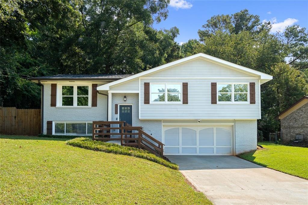 This fully updated home offers a great balance of style and functionality. The kitchen features soft-close cabinets, quartz countertops, and a clean, modern feel that’s both practical and inviting.
Downstairs, the finished basement includes a wet bar and plenty of space for movie nights, game days, or guests.
Out back, you’ll find a large yard that is perfect for pets, play, or just enjoying the outdoors. The roof is newer and in great condition, and the two-car garage adds extra storage and convenience.
It’s a home that’s been cared for and thoughtfully updated - ready for you to move in and make it your own!