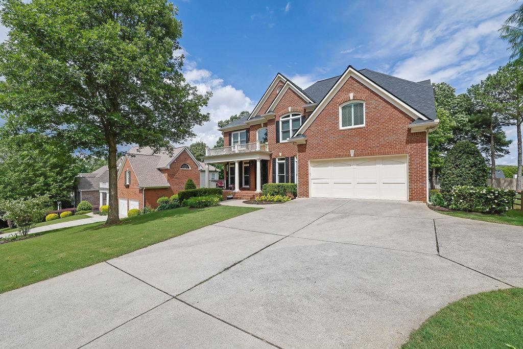 Welcome to this exceptional John Wieland resale located in the highly sought-after Enclave section of Creekside, a community where homes rarely become available. Showcasing over $160,000 in premium upgrades since 2021, including BRAND NEW WINDOWS throughout (2022), a show-stopping wrought iron front door (2022), NEW CARPET throughout (2024), NEW HVAC upstairs (2022), NEW KitchenAid double ovens (2023), and a new fully-fenced backyard. Plus, BRAND NEW FINISHED BASEMENT completed in 2025 adds a private bedroom and full bath, with a soundproofed ceiling, ideal for a guest suite, media room, or studio. On the main level, enjoy a dedicated office, formal dining room, and a dramatic 2-story great room filled with natural light. A beautiful screened porch provides the perfect place to relax or entertain. Upstairs, you’ll find 4 bedrooms, including a luxurious owner’s suite with a spa-inspired ensuite bath and a bonus flex room, perfect for a nursery, office, or home gym. Secondary bedrooms are connected by a Jack-and-Jill bath and the other bedroom upstairs features its own private bathroom. Enjoy resort-style living with Creekside’s top-tier amenities: clubhouse, pool, tennis courts, playground, and fitness center. Located in a top-rated school district with easy access to GA-400, this home truly has it all. Welcome home!