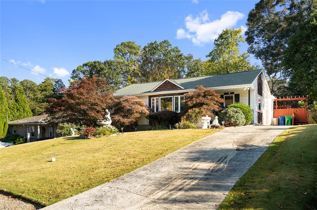 This well-cared-for 1950 ranch is move-in ready and offers plenty of room to make it your own over time. It’s bigger than it looks, with three comfortable bedrooms, two and a half baths, and a few extra spaces that work great for an office or quiet sitting area. The major systems are already updated—roof, HVAC, and water heater—so you can focus on adding your own touches. The fenced backyard is a standout, with mature trees, established landscaping, a deck, and a lower patio with a pergola that’s perfect for relaxing or entertaining. You can’t beat the location—close to CHOA, Emory, the CDC, and easy highway access, plus shopping and restaurants nearby at Toco Hills. A great home in a convenient spot that’s been well cared for and ready for its next chapter.