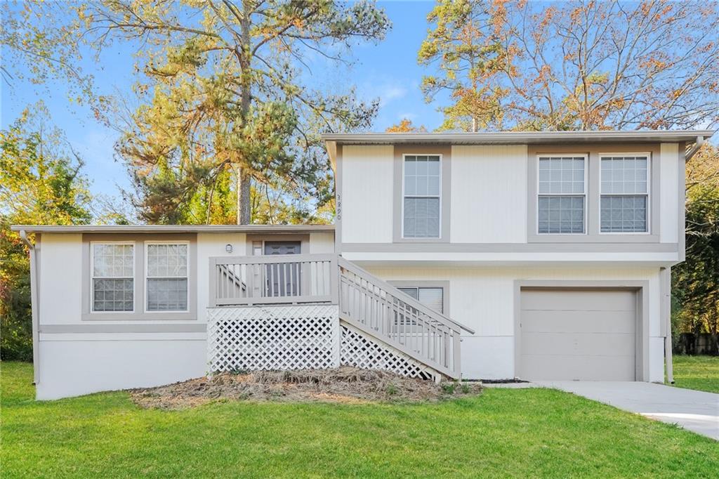 Beautifully renovated 3-bedroom split level home in Decatur. This home has a 1 car garage that is very deep and may be able to even fit 2 cars if parked one in front of the other. The great room has vaulted ceiling and charming wood beams. The dining room is open yet still defined. The kitchen has new white cabinets, stone countertops, and all new stainless-steel appliances. The bathrooms have both been updates also. This home has extra flexibility with more finished space in the basement - perfect for a home office, using as an extra bedroom, or additional living/entertaining area. This home has all new flooring, fresh paint, and is move-in ready!