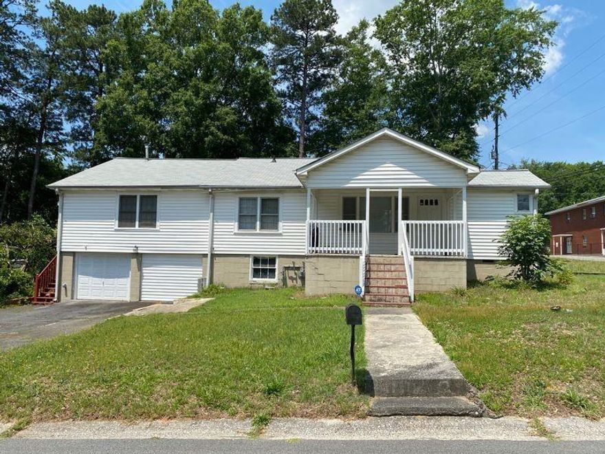 FANTASTIC LOCATION 1.2 MILES FROM HISTORIC MARIETTA SQUARE! This INVESTOR SPECIAL and offers IMMEDIATE cash flow potential. Charming raised ranch on large corner lot. 8 rooms, 2 full bathrooms and 2 kitchens (Full basement kitchenette). Beautiful hardwood floors and large master bedroom suite. Residential property with C-3 Zoning designation. Residential and commercial usage. Quite neighborhood with easy access to shopping, restaurants and I-75 Interstate. Please schedule all appointments through Showing Time. You will not want to miss out on this MONEY MAKER! This home is on a nice level corner lot and near by shopping, entertainment, Marietta Square, Truist Park, and Dobbins. Minutes to Town Center Mall, Cumberland Mall, 120 Loop, I-75 and I-285.