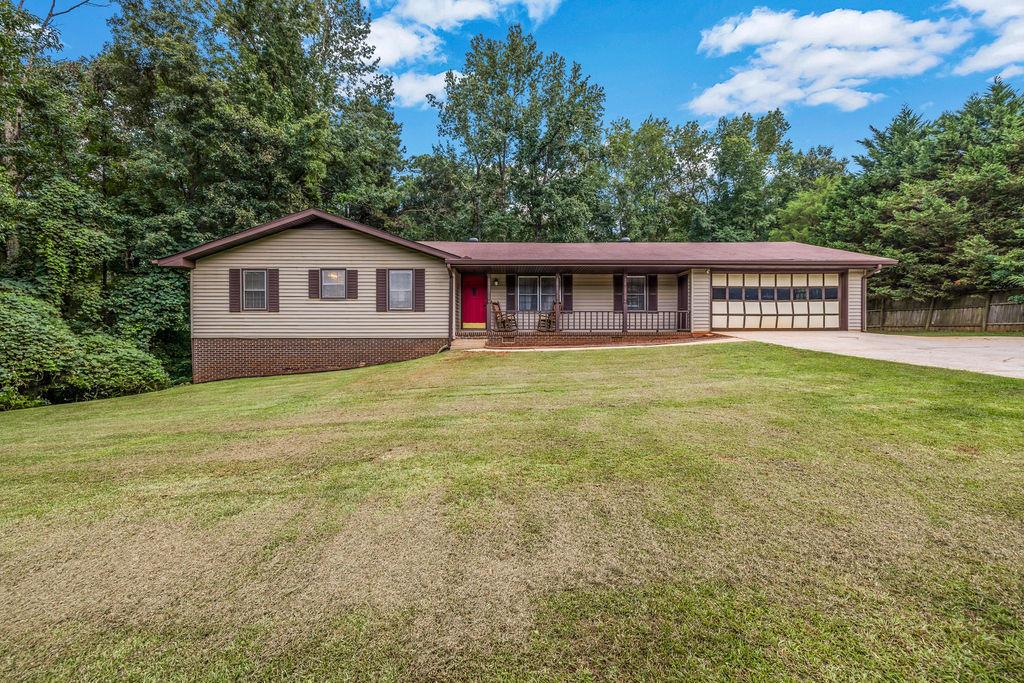 Playful & Personality-Packed
3BR/2BA Ranch with Quirky Charm and Room to Play
Why settle for cookie-cutter when you can have character? This updated ranch serves up an inviting mix of hardwood and tile floors, an on-trend kitchen and bathrooms, plus a partial basement waiting for your creative touch.
Host game nights or backyard barbecues on the spacious deck overlooking a big, level yard—plenty of space for cornhole or a hammock under the stars. Two-car garage? Check. PickiVicki Approved? Double-check. Special financing is available with preferred lenders, so bring your imagination and make this one your happily-ever-after! **OWNER OCCUPIED WITH ALARM. NEED Appt to show.