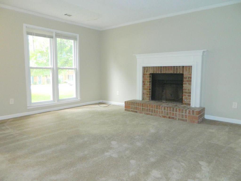 INVESTOR DREAM - CASH COW - NO RENTAL RESTRICTIONS-NO HOA ..Nice,spacious,END UNIT, updated TOWNHOUSE , fresh paint interior/exterior, new carpet upstairs and new faux vinyl hardwood flooring main level, brick fireplace in living room, attached dining room, spacious eat in kitchen. Two separate master suites each with private bathrooms. Ceiling fans thru out, private fenced patio with two attached storage closets. End unit, 2 car off street parking pad.
