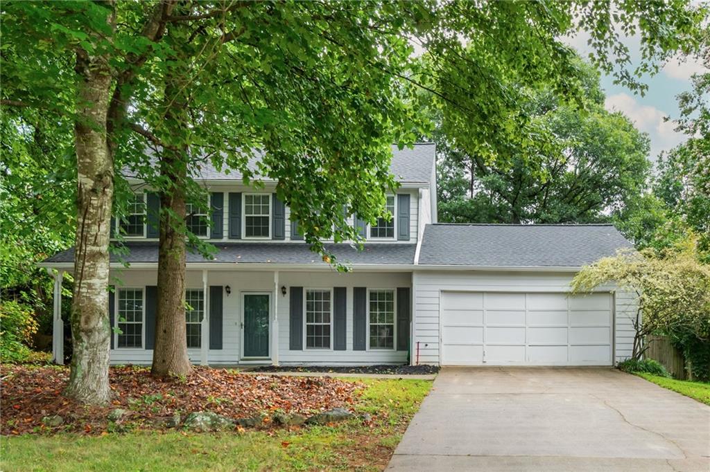 This charming home on a quiet cul-de-sac blends thoughtful updates with inviting spaces inside and out. A rocking chair front porch sets the tone, leading into an oversized family room with a cozy fireplace. LVP flooring throughout the main level. The renovated kitchen boasts quartz countertops, stainless steel appliances, and gas range, perfect for both everyday living and entertaining.
Upstairs, you’ll find spacious bedrooms, including a serene primary suite with walk in closet and primary bath featuring a double vanity with granite countertops. Step outside to enjoy a private, fully fenced backyard—ideal for relaxing, playing, or hosting friends!
Perfectly located just minutes from I-75 and the Peach Pass on/off ramp, this home offers easy commuting and quick access to Lake Acworth, Kennesaw State University, Downtown Acworth, and all the shopping and dining Kennesaw has to offer. With its prime location, modern updates, and move-in-ready condition, you won’t want to miss this sweet home!