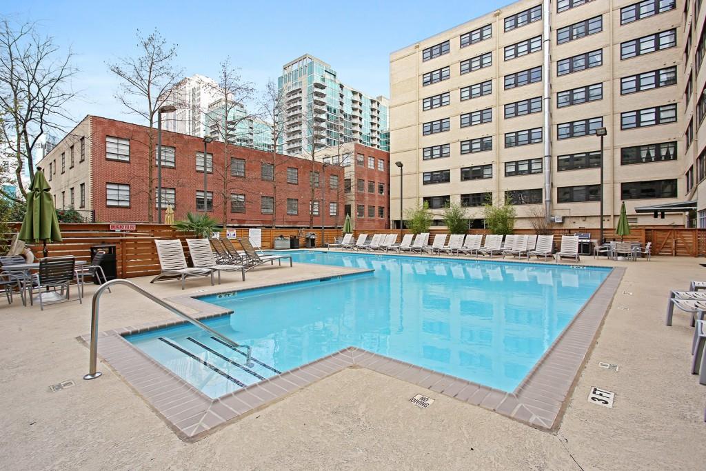 Perfect Top Floor Studio unit in one of Midtown's most sought-after buildings! Located in the heart of Midtown, this unit offers a renovated kitchen, bathroom, hardwood floors and 1 optional parking space ($150/mth). Building amenities include 24/7 concierge, laundry room, fitness center, pool, multiple gas grills and dog park. Downstairs is within walking distance to Starbucks Reserve, Dunkin, Fresh to Order, Vortex, Fado's & Laughing Skull. The overall Midtown amenities include numerous world-class restaurants, Piedmont Park, Whole Foods and convenient access to interstates. Easy access to Emory, Northside & Piedmont Hospitals. Quick walk or Uber to the Eastside Beltline Trail! 5-min Uber to Ponce City Market and Beltline restaurants/bars! Indulge in Atlanta's best-connected neighborhood with this cozy studio loft!