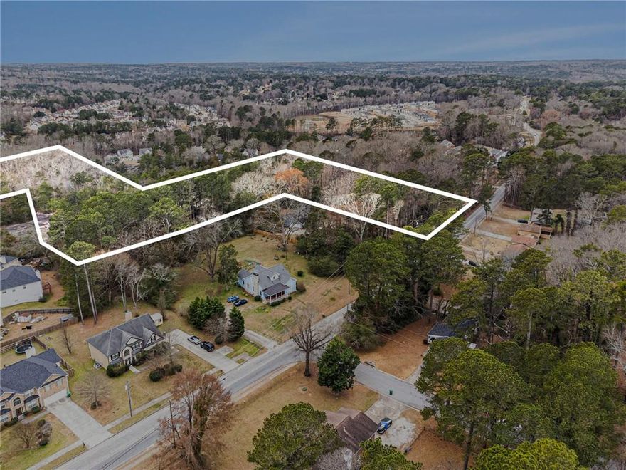 20+ acres near Hwy 124, Stonecrest Mall, Stone Mountain Park, and Hwy 78. Possible uses: Platted subdivision, home site, or recreation.