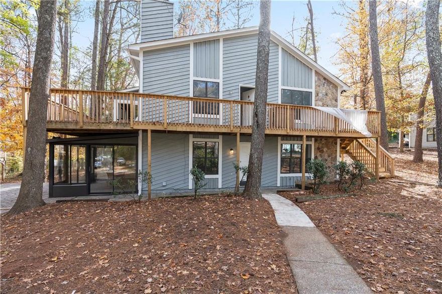 Welcome home to this Well-appointed centrally located Alpharetta residence. This recently renovated charming property is Move-in ready and offers a lifestyle of convenience. This home features a Modern cozy electric fireplace in the Family/great room, Separate dining room, kitchen with new Quartz countertops and Breakfast Bar,  new appliances, new LVP flooring,  2 large bedroom with 2 recently renovated bathrooms. Step outside to the oversized sunroom that has direct access to the side patio perfect for a game day cookout or just a place for relaxation. Positioned for easy access to a major highway, this location effortlessly connect you to all the excitement Alpharetta/Roswell has to offer. Immerse yourself in Alpharetta/Roswell's charm and explore the local parks, diverse dining options, shopping, banking, car dealerships and exciting entertainment opportunities that make this neighborhood so greatly desired.