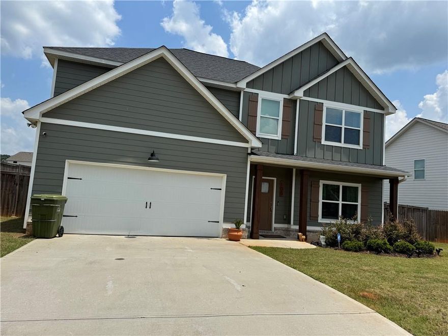 Step into timeless elegance beautifully maintained "like new" Braxton floor plan, located in the desirable Northpoint Grand Subdivision.The home offers 4 bedrooms and 3 full bathrooms. Upon entry, you're welcomed by a foyer that leads to a formal, modern-styled dining room. The open floor plan is bathed in natural sunlight, creating a warm and inviting atmosphere. Just 3 years old, the home features a guest room, full bathroom, and a spacious living room on the 1st floor. Upstairs, the oversized owner's suite includes a cozy sitting area, perfect for relaxation. The additional bedrooms are generously sized and share another full bathroom, along with a large loft, ideal for movie nights. The large, level lot is fully fenced and includes a covered, screened enclosed patio for outdoor enjoyment.