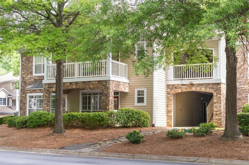 Live TALL and welcome home to easy, low-maintenance living in this beautifully updated first-floor, walk-in level condo, located in a highly desirable gated community. With a low monthly HOA fee of just $148, residents enjoy a wealth of amenities including a swimming pool, tennis courts, fitness center, professional landscaping, grounds maintenance, trash pickup, and pest and termite control. Inside, the home offers a spacious and light-filled master bedroom complete with a tray ceiling and a generous walk-in closet. The fully renovated bathroom exudes modern elegance, featuring double vanities, resurfaced tub and shower, new countertops and sinks, sleek new faucets, and a freshly painted vanity. The kitchen combines style and functionality with solid surface countertops, a breakfast bar, freshly painted cabinets, and newer appliances, and includes washer and dryer. A new kitchen sink, faucet, and disposal enhance convenience, while updated lighting in the kitchen, dining area, and bathroom adds a fresh, contemporary touch. Throughout the home, you'll find all-new flooring, new ceiling fans in both the living room and bedroom (a brand-new addition), and updated door knobs and cabinet hardware that contribute to a polished finish. Recently installed plantation shutters add charm and privacy, and a new water heater, installed in 2024, provides added peace of mind. Perfectly positioned in the first building of the community, the unit offers quick and easy access for daily comings and goings. The location is ideal—just minutes from Windward, Avalon, Downtown Alpharetta, Halcyon, Hwy 9, and GA 400—offering unmatched convenience and connectivity. Move-in ready and loaded with thoughtful upgrades, this condo is a true gem you won’t want to miss. Schedule your showing today!