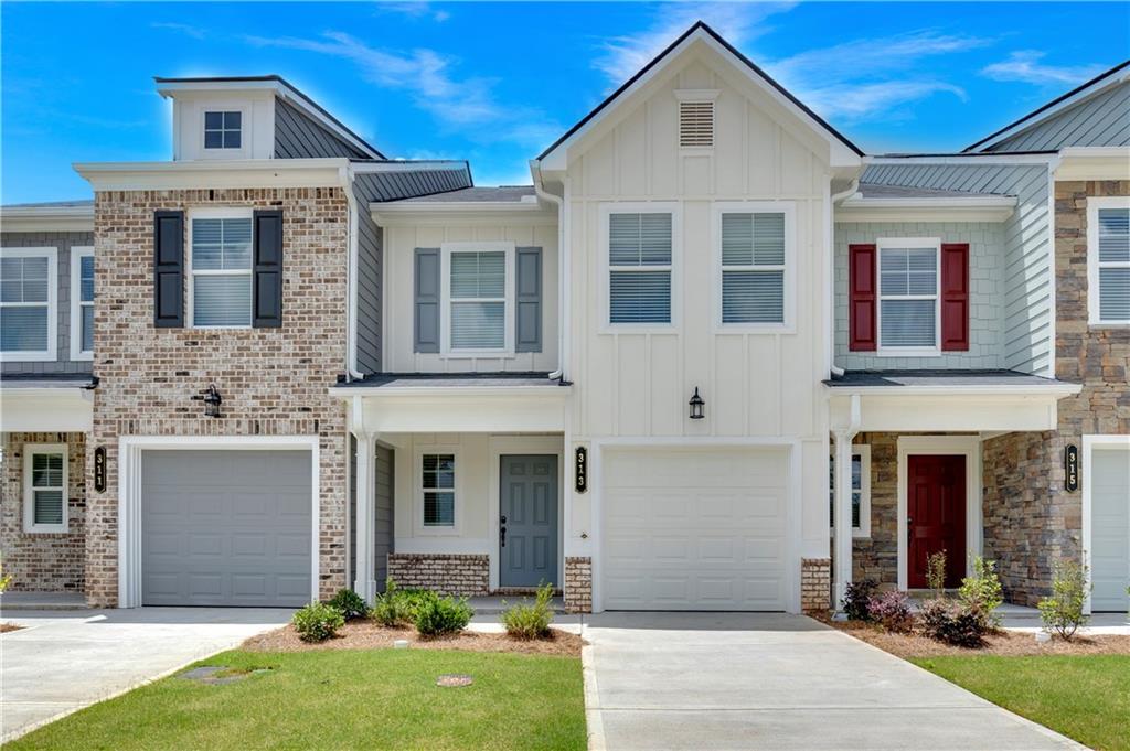 Move-in ready and full of charm, the Crape Myrtle at Village Green is a well-designed 3-bedroom, 2.5-bath new construction townhome. The open-concept main level features LVP flooring, a stylish kitchen with 36 inch Cabinets and Granite Countertops, tile backsplash, and a spacious island with overhang—perfect for entertaining or everyday living. All appliances are included for added convenience. Upstairs, the private primary suite offers a spa-like bathroom with double vanities, Tile Shower and Flooring, and 2 walk-in closets. Located in Adairsville with easy access to I-75, Village Green offers affordable, low-maintenance living with builder warranties and 100% USDA financing options available. Ask about our current Builder Incentive.