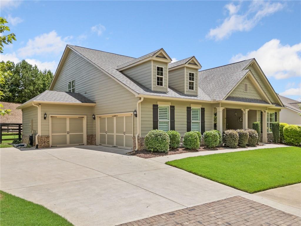 Stunning Ranch Home with Oversized Owner's Suite, Gorgeous Finishes & Incredible Storage! This beautifully maintained home offers the ideal layout with the primary suite and two guest bedrooms on the main level. The oversized owner's retreat features a private sitting area, a luxuriously updated bath with new quartz countertops, and a custom walk-in closet that’s a dream come true. The two guest bedrooms share a Jack & Jill bath, perfect for family or visitors. A separate study/office, formal dining room, and a spacious family room with fireplace provide flexible living and entertaining space. The gourmet kitchen is the heart of the home with granite countertops, a large breakfast island, custom-built pantry, and a newer refrigerator and pull-out shelves in lower kitchen cabinets and double trash bin in cabinet. Step outside to enjoy the large covered front porch or relax on the expansive back patio equipped with remote-controlled patio screen, perfect for year-round enjoyment. Upstairs you'll find a 4th bedroom or bonus room with a full bath, ideal for a guest suite, hobby room, or teen space. Gorgeous hardwood floors flow throughout the main living areas, with tile in all bathrooms and carpet in the secondary bedrooms.
Additional features include:3-car garage, Leaf gutter guards, New double glass front entry doors, Enormous walk-in attic storage, instant hot water with recirculating pump, owned security system, whole house surge protector, Interior freshly painted (October 2024), Exterior painted approx. 18 months ago
This home truly has it all — space, comfort, upgrades, and storage galore. Don’t miss your opportunity to call it yours!