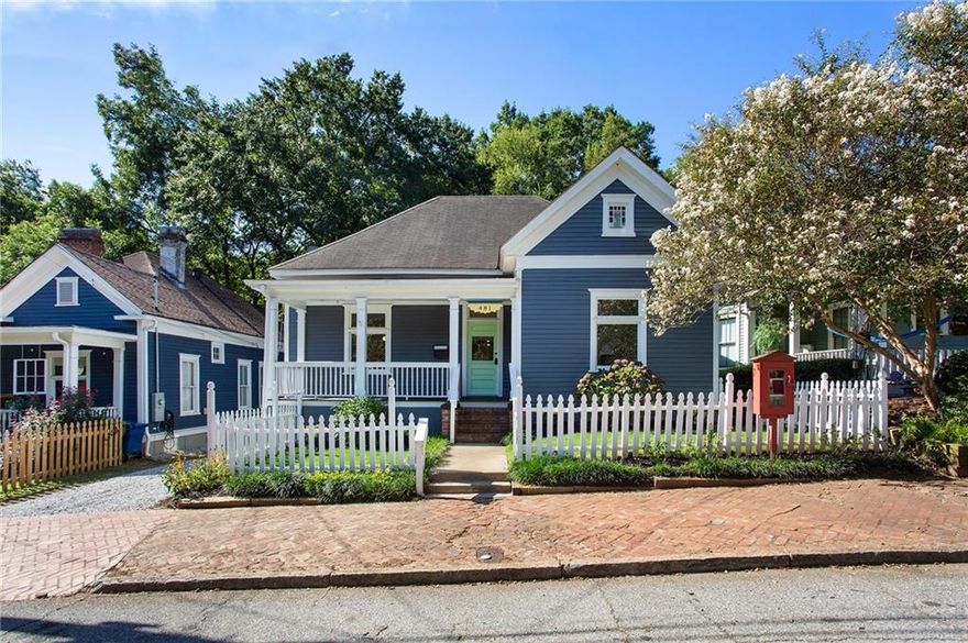 Welcome to 481 Glenwood Avenue SE—a beautifully renovated Grant Park bungalow where vintage charm meets modern comfort. This inviting 3-bedroom, 2-bathroom home offers 1,888 sq ft of thoughtful design and timeless character. From the rocking-chair front porch framed by a white picket fence to the hardwood floors throughout, every detail feels warm and welcoming.
Step inside to discover a cozy family room with a linear fireplace and floating wood mantle, where memories will be made. The chef’s kitchen is a modern delight—with upgraded appliances, ample white cabinetry, a marble waterfall island, and a spacious butler’s pantry—perfect for hosting dinners or whipping up your favorite recipes.
The oversized primary suite is a refined retreat, boasting a walk-in closet, dual vanities, a soaking tub, and a step-in tile shower. Two additional bedrooms share a beautiful decorative, double-sided fireplace.
Outdoor living is just as dreamy—with two back decks overlooking a shaded backyard, ideal for relaxing evenings and weekend gatherings. An unfinished daylight basement adds flexibility, ready for storage, a workshop, or future personalization. With off-street parking available, convenience is just as close as the home itself.
Located in the heart of Grant Park, this home offers neighborhood living at its best—walk to festivals, farmers’ markets, cafés, shops, and enjoy bike rides and picnics in one of Atlanta’s most friendly and connected communities.