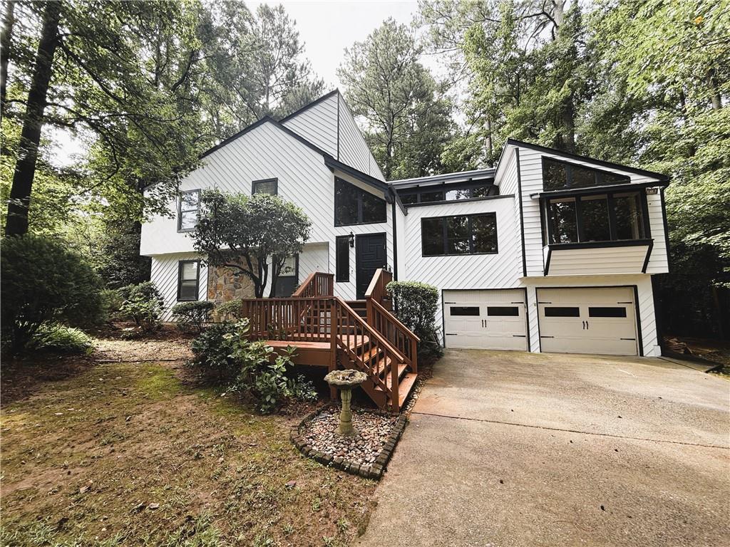 Discover this beautifully crafted 4-bedroom, 3-bath home with a full in-law suite, set in one of Marietta’s most sought-after neighborhoods. Ideally situated within East Cobb’s top-rated school district, this residence offers the perfect balance of comfort and versatility.
From the moment you arrive, the leveled lot and welcoming façade set the tone. Inside, an open-concept layout unfolds with gleaming hardwood floors, soaring natural light, and a family room anchored by a charming fireplace—ideal for both quiet evenings and lively gatherings.
The primary suite is a serene escape, complete with a sleek, updated spa-like bath designed for ultimate relaxation.
Downstairs, the fully finished basement with its kitchen transforms into a versatile retreat—whether you envision it as an in-law suite, private guest quarters, a rec room, gym, or stylish bar. With indoor and outdoor access, this space adapts to your lifestyle with ease.
Step outside and unwind in your backyard sanctuary. A spacious deck overlooks an expansive, green yard—perfect for gardening, play, or simply enjoying the calm of nature.
? Highlights You’ll Love ?
Long driveway with space for 4+ cars
True two-car garage
Nationally recognized schools
Minutes from shopping, dining, and recreation
Whether you’re hosting friends, working from home, or stargazing on the deck, this home offers a rare blend of livability and comfort.
Don’t miss the chance to call this East Cobb gem your own—schedule a private showing today!