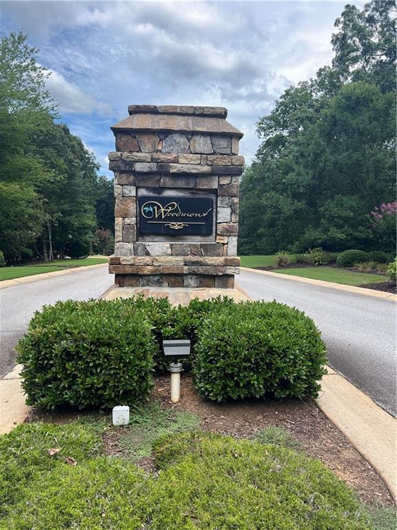 LOT 43 a Basement Lot. BRING YOUR PLAN to build your dream home. Lot 43 Beachwood Drive is located in the Beautiful Woodmont Subdivision. This neighborhood is well developed, offers public water, septic is required for each lot, internet service is available. Bring your plans and builder to build your dream home. The required home size is 2400 sqft. We can offer a builder with plans if needed. Lot 42 Beachwood Drive and the corner lot 45 Woodmont Drive are available to build on as well.
