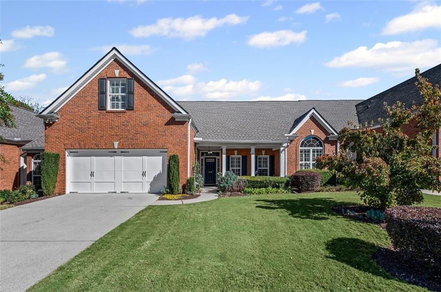 This beautifully refreshed Claremore Lake home is ready for you!  It's been freshly painted throughout and has brand-new flooring in the main-level common areas. Everything feels light, bright, and ready for you to move right in. From the step-free entrance, you're welcomed into an open foyer that flows seamlessly into the den and kitchen which is perfect for gatherings, entertaining, or simply relaxing at home. The primary suite on the main level is a peaceful retreat with vaulted ceilings and a tranquil view of the private back patio with great landscaping. Another spacious bedroom and a full bath complete the main floor, while upstairs offers a versatile third bedroom with its own private bath which is ideal for guests, an office, or hobby space. Life in Claremore Lake is all about ease and connection. Enjoy a clubhouse, pool, exercise room, lawn care, exterior maintenance, and planned social activities, giving you more time to simply enjoy your surroundings. Step outside your door and walk to shopping, dining, and Onelife Fitness, or take a short drive to Downtown Woodstock and I-575 for even more convenience. With new roofs installed by the HOA in 2022, you can move in with confidence and peace of mind. This isn't just a house... it's a low-maintenance lifestyle, ready and waiting for you to make it your own.