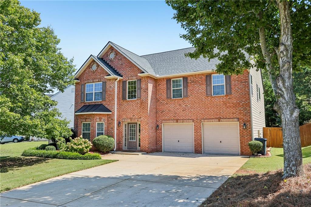 Don’t miss this beautifully maintained, move-in ready home nestled in the sought-after Autumn Cove community! This spacious residence offers 5 bedrooms, including an oversized primary suite featuring a luxurious en-suite bath with double vanity, jetted soaking tub, separate shower, and a custom walk-in closet system.
The heart of the home is the expansive chef’s kitchen with granite countertops, a large island, and breakfast bar seating, perfect for entertaining or casual family meals. The open concept layout flows seamlessly into the separate dining room and cozy family room with a gas fireplace, creating a warm and inviting atmosphere.
Step outside to your private, fenced backyard oasis, complete with a patio, lush green lawn, and beautifully landscaped surroundings. Ideal for relaxing or hosting friends and family.
The main floor HVAC is less than a year old, and the roof is only two years old, offering peace of mind for years to come. Residents of Autumn Cove enjoy access to a community pool with a grilling area and love the convenience of being close to Publix, Kroger, Costco, restaurants, shopping, entertainment and 400.
This home truly has it all! Space, style, updates, and location. Schedule your tour today and make this stunning property your forever home!