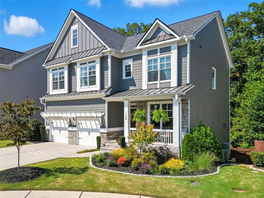 Stylish updates, thoughtful design, and space for every stage of life come together in this 5 bedroom, 4.5 bath home in Woodstock’s sought-after Oakhurst community.
Across all three finished levels, you’ll find luxury vinyl plank flooring throughout. The main floor showcases a bright island kitchen with quartz countertops and a large center island, open to the great room for seamless entertaining. A dedicated office provides the perfect work-from-home setup, while the screened back porch creates a relaxing indoor-outdoor retreat.
Upstairs, the spacious owner’s suite is a true retreat—complete with a customized walk-in closet designed for organization and style. Three additional bedrooms and a versatile loft provide plenty of flexibility for family, guests, or hobbies.
The finished basement expands the home’s living options with a private bedroom and full bath, a large recreation room, workout space, and access to a covered deck overlooking the fenced backyard.
Recent updates include a new roof and fresh exterior paint, adding peace of mind and curb appeal.
Located in the highly rated River Ridge High School district, this home blends everyday comfort with long-term value. Oakhurst residents also enjoy access to community amenities including a pool, playground, and green spaces. Plus, you’re just minutes from shopping, dining, and entertainment in Woodstock—consistently ranked among the best places to live in Georgia.
