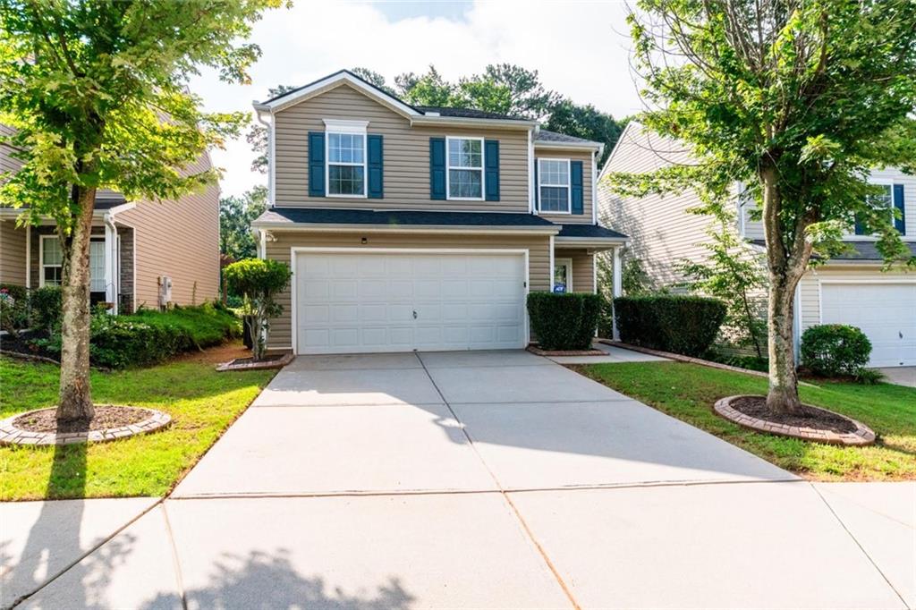 The main level features an open floor plan with natural light throughout, a fully renovated kitchen with soft-closing drawers, a large pantry, and modern appliances. Upstairs has 3 large bedrooms with walk-in closets, fully renovated bathrooms with tile showers, laundry room with W/D hookups. Luxury Vinyl Plank throughout the whole house, air conditioning, fenced yard, and garage. Enjoy the great amenities of swim/tennis/basketball/playground community, conveniently located minutes from HWY 400 and great shopping, close to Lake Lanier and downtown Cumming.