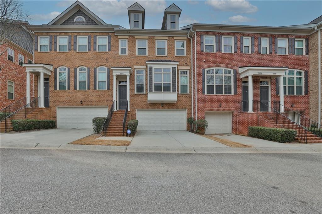 Located in a charming gated community, this lovely townhome is just a leisurely walk from Smyrna Market Village, Food Truck Tuesday, and only a short drive to Truist Park. Perfect for roommates or a growing family, it offers 3 bedrooms and 3.5 bathrooms. The lower level makes an ideal space for an office or an extra bedroom/living space. Inside, you'll find beautiful cherry cabinets, granite countertops, and stunning hardwood floors throughout the main level. The home is bright and airy, with windows all around, creating a welcoming atmosphere. You won't find a cleaner, move-in-ready home in Smyrna. Plus, it's just minutes away from B Head, Downtown Smyrna, and the Airport. The move-in date is negotiable. Call the agent for details.