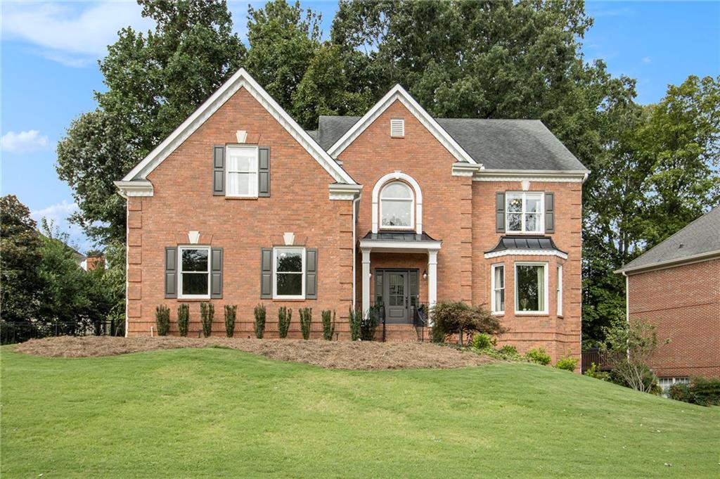 Welcome to 610 Rain Willow Lane, a well-maintained Johns Creek classic in the sought-after Sugar Mill community, within walking distance of award-winning Northview High School!
Warm caramel hardwoods welcome you into this lovingly-cared for home. Wind your way through from the grand entry foyer, to the smart office/study, into the dining room, out to the open, stylish white kitchen and breakfast area, into the 2-story fireside great room, dripping in natural light. Recent upgrades include a renovated powder room, new front & garage doors, updated lighting (foyer chandelier, dining, breakfast & powder rooms), and fresh paint throughout. The upper level features new carpet, updated bathrooms, and a spacious primary suite with a remodeled bath, a perfect place to retreat to after a long day.
You can't beat the finished terrace level complete with bedroom and full bath, media room, rec/office space, wet bar & new flooring! Yard improvements include a fully fenced backyard, new landscaping, drainage correction & irrigation system in front. Added bonus: Two years young HVAC and 2022 tankless water heater! Enjoy resort-style community amenities: a newly redecorated clubhouse, Olympic-sized pool with slide, 10 lighted tennis courts with onsite director, playground, playing field, and stocked fishing lake! Conveniently located near parks, trails, and top-rated shopping and dining and minutes to Medley Johns Creek, Johns Creek Town Center, The Forum, St. Ives Country Club, Atlanta Athletic Club, Emory, 85, and 400! Live in the heart of Johns Creek—#1 Best Places to Live in Georgia!