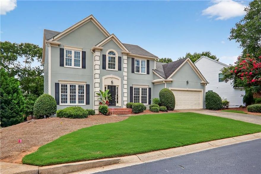 Welcome to 1070 Brockton Close, a beautifully updated 5-bedroom, 2.5-bath traditional home located in the heart of East Cobb's highly coveted Walton High School district. Ideally situated in the sought-after Park at Paper Mill community, this elegant residence blends timeless charm with thoughtful modern updates and enjoys a prime location just minutes from Atlanta Country Club, I-285, and I-75. Inside, you'll find hardwood floors, fresh interior and exterior paint, and a fully renovated chef's kitchen featuring stainless steel appliances, quartz countertops, custom cabinetry, and an oversized island with breakfast bar. The kitchen flows seamlessly into a light-filled dining area and out to a spacious deck, perfect for entertaining, with stairs that lead down to the private backyard. Upstairs, the generous primary suite features a spa-inspired bath and walk-in closet. Three additional bedrooms and a beautifully updated hall bath complete the upper level. The finished terrace level offers a private guest bedroom, a flexible gathering area, and two large storage rooms. Additional features include a welcoming entry foyer, an updated fireplace in the living room, a laundry room conveniently located off the kitchen, and a two-car garage at main level. Recent upgrades also include newer energy-efficient windows and a new front door. Residents of the Park at Paper Mill enjoy a low-maintenance lifestyle with HOA fees covering lawn care, swim and tennis, water and sewer, trash pickup, road and common area maintenance, termite control, and insurance. Community amenities include a beautifully maintained pool, playground, grilling area, tennis courts, and a scenic walking trail that wraps around the pond. Zoned for top-rated Sope Creek Elementary, Dickerson Middle, and Walton High School. Just moments from Parkaire and Merchants Walk shopping centers, local dining favorites, and outdoor recreation at the Chattahoochee River, Sope Creek, and Paper Mill trails. Move-in ready and thoughtfully updated, this home checks every box: exceptional schools, unbeatable location, and a warm, welcoming community