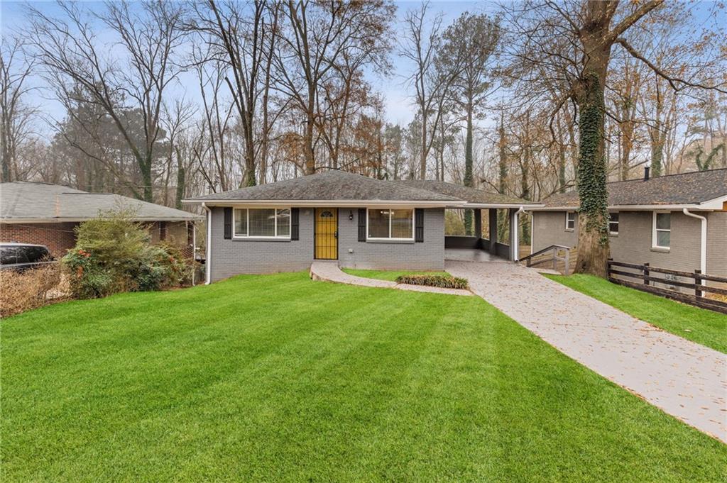 HUGE PRICE REDUCTION! Welcome to this beautiful renovated 4 Bed | 2 Bath 4-sided BRICK RANCH with Finished Basement, situated in a lovely quiet neighborhood, minutes from the Airport and Atlanta downtown, perfect for first-time home buyers. This beautiful Ranch has nice renovation. The home features a modern kitchen with tiles floor, Granite countertops, cabinets, and Glass Tiles Backsplash. The kitchen also boasts stainless steel appliances including refrigerator, recessed lighting, and a galley design lightings. Upgraded Bathrooms with vanities, sinks, toilets, and designer showers, Glass Tiles. Fresh new paint has been applied throughout the home. The Open Concept large family room with dining and kitchen is perfect for gatherings with loved ones. This home is conveniently located near downtown and Atlanta airport, near schools, shopping, malls, and dining options. Don't miss out on the chance to own a upgraded home. NO HOA, NO rental restrictions! Schedule a viewing today, and welcome home!