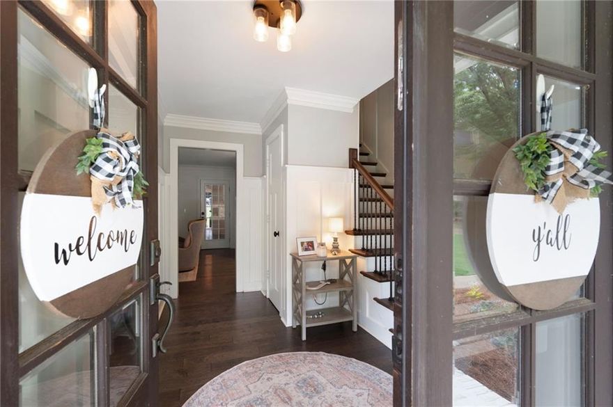 Every inch of this stunning home has been thoughtfully renovated with both style and functionality in mind. From the brand-new roof to the beautifully reimagined interiors, no detail has been overlooked. Step onto the charming front porch—now covered and finished with a durable metal roof—and enter a home where modern updates meet classic craftsmanship. Inside, you'll find custom woodwork on the walls, new stair treads with elegant iron spindles, and a bright, refreshed living room where dated paneling has been removed and stylish new countertops added to the built-ins. The heart of the home is a completely reconfigured, open-concept kitchen that now flows seamlessly into the living and dining spaces. It boasts brand-new cabinets, high-end appliances, stunning countertops, a designer backsplash, and a custom pass-through window that connects to the showstopping back porch. The mudroom enhances everyday living with a custom built in dog kennel, offering a stylish, functional solution for pet owners. The expansive, covered back porch is an entertainer’s dream, featuring a stone fireplace, a warm wood ceiling, and views of one of the largest lots in the subdivision. Over 100 trees were removed to create a lush, fenced-in backyard—perfect for outdoor play and relaxation. There is plenty of room to add a custom pool to complete the oasis in the backyard. Even better, the property backs up to wooded acreage, providing a natural backdrop where deer and wild turkey are frequently seen. Upstairs, all bedrooms and bathrooms have been tastefully renovated with high-end finishes, and the laundry room has been relocated upstairs for added convenience. The full basement adds even more value with a bathroom, office space, ample storage, and a dedicated workshop beneath the porch. This truly move-in-ready home offers modern living with timeless appeal. It’s one you must see to believe! Nestled in a timeless, established neighborhood known for its mature trees, spacious lots, and beautifully maintained homes and yards, this property offers rare charm and character that’s increasingly hard to find in newer developments. Located in a highly sought-after school district, this home combines luxury, comfort, and convenience in one exceptional package. It’s truly move-in ready and a must-see!