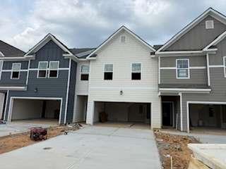 Modern Luxury Townhome in Rivershire Place. Nestled in the sought-after Villa Rica area, Rivershire Place offers a harmonious blend of modern living and convenience. This meticulously designed townhome features an open-concept layout, high ceilings, and a smart home technology package. Modern kitchen with stainless steel appliances, 42" Gray cabinets, tile backsplash, granite countertops, large island, and pantry. Oversized owners' suite with walk-in closet and spa-like ensuite bathroom with oversized shower. All rooms equipped with 2" faux wood blinds. Scheduled to be completed in December. Conveniently located just minutes from I-20 and Downtown Villa Rica, offering diverse dining options. A short drive to Sweetwater Creek and Arbor Place Mall adds to the appeal of this vibrant community. Please schedule an appointment to tour our decorated model homes. Interior photos are stock photos of the decorated model home with the same floor plan. Quik Move-in
